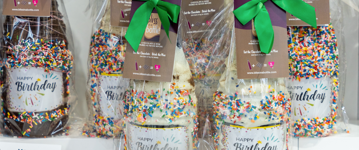 Chocolate covered birthday wine bottles with sprinkles